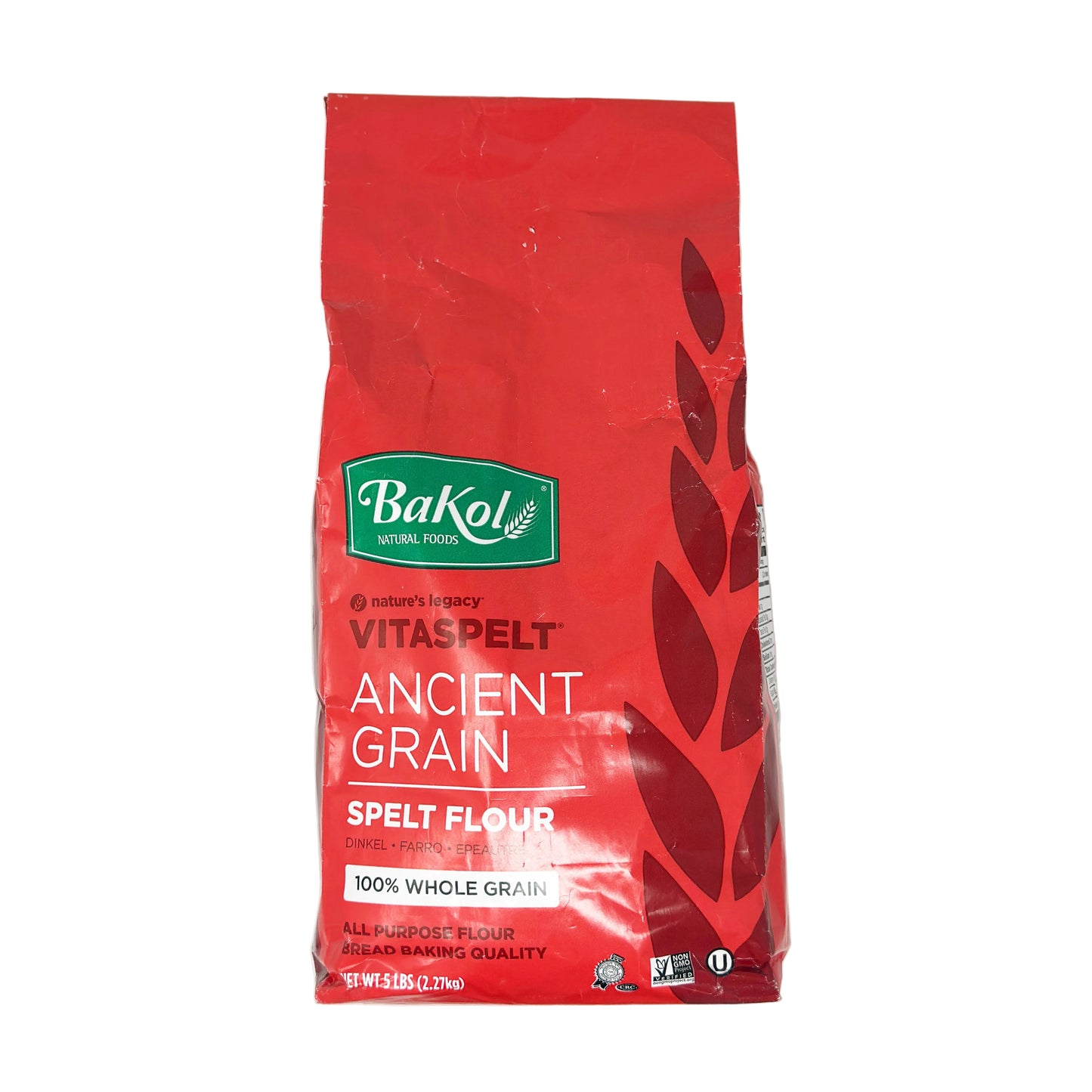 A package of Bakol Vitaspelt Ancient Grain Whole Grain flour, with a red and green design, indicating it is a 5 lb bag.