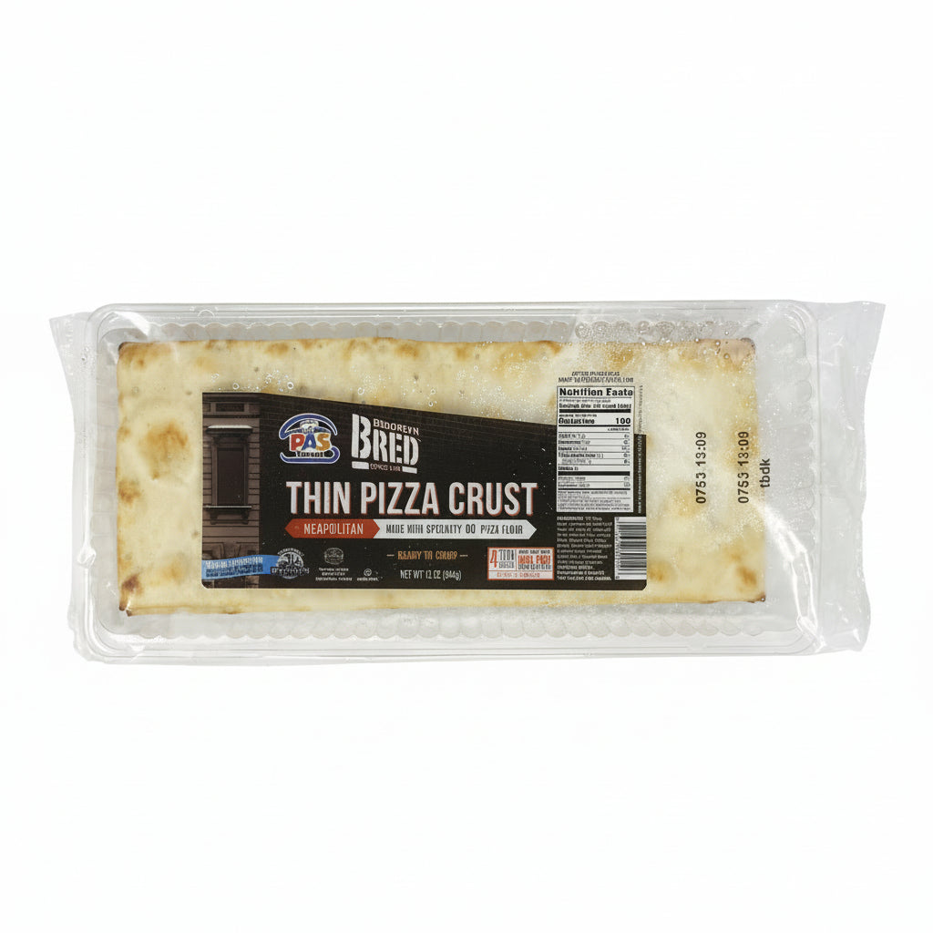 Packaged Pas Yisroel Thin Pizza Crust in a plastic container showing the product and its label.