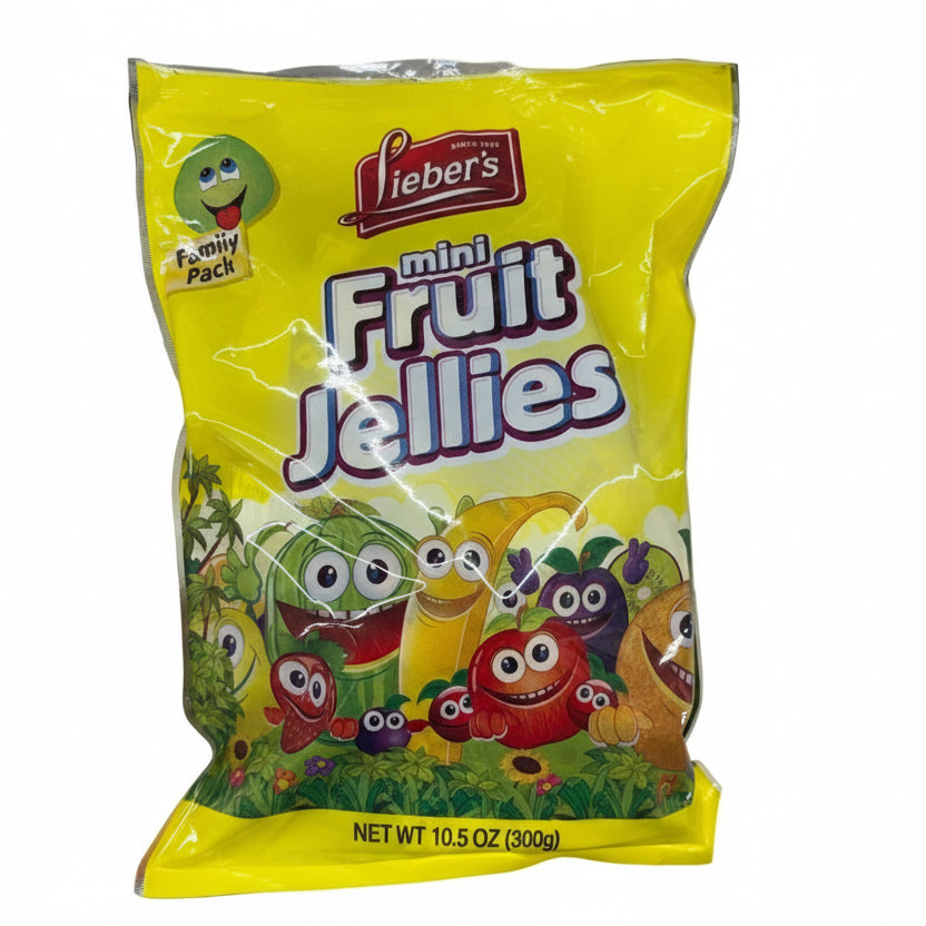 Hand holding a package of Lieber's mini fruit jellies with colorful cartoon characters