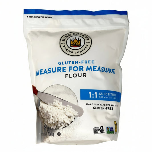 Bag of King Arthur Gluten-Free Measure for Measure Flour on a white background