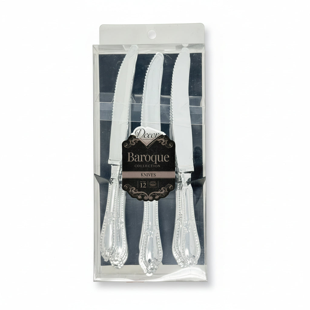 Set of silver knives in packaging with 'Decor Baroque Collection' label on a white background