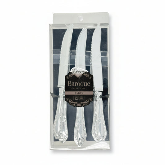 Set of silver knives in packaging with 'Decor Baroque Collection' label on a white background