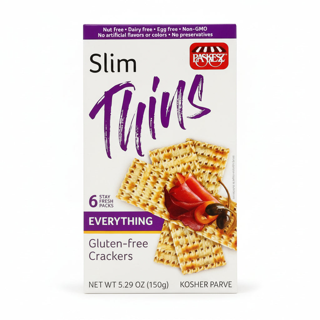 Box of Slim Thins gluten-free crackers with a picture of crackers and a spread on a white background