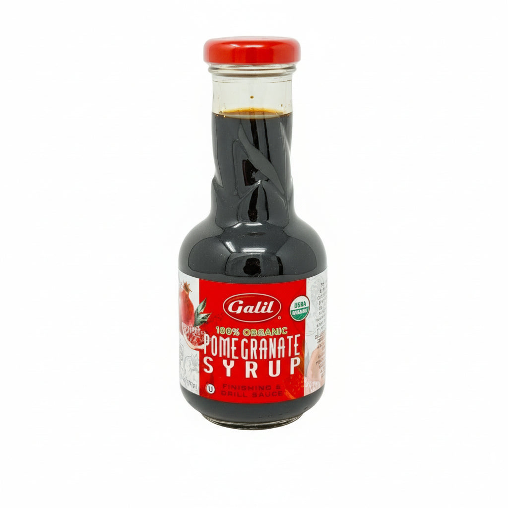 Bottle of Galil Pomegranate Syrup on a white background
