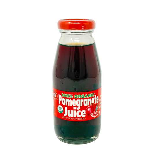 Bottle of 100% Organic Pomegranate Juice on a white background