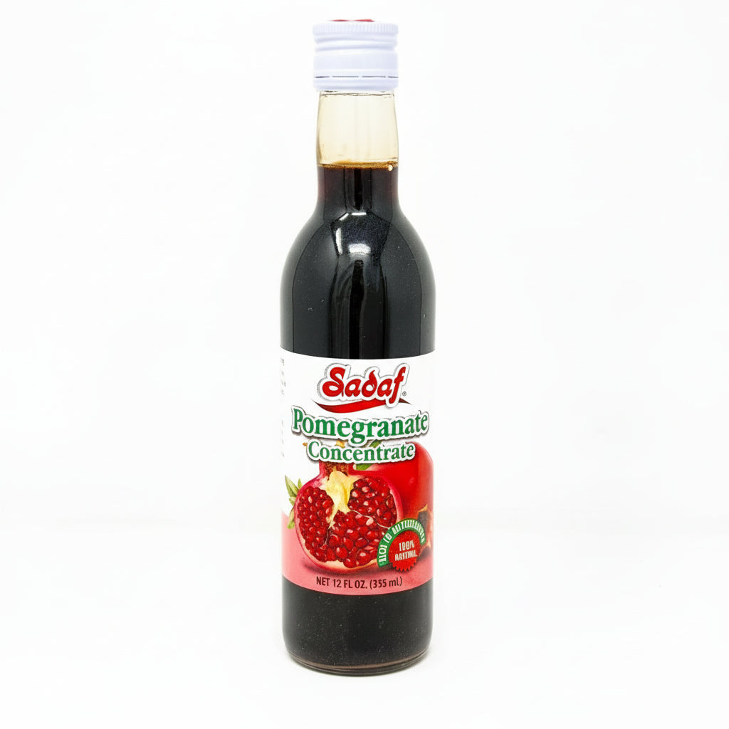 Bottle of Sadaf Pomegranate Concentrate on a white background