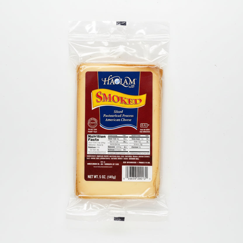 Packaged slice of smoked American cheese with Haalam branding on a white background
