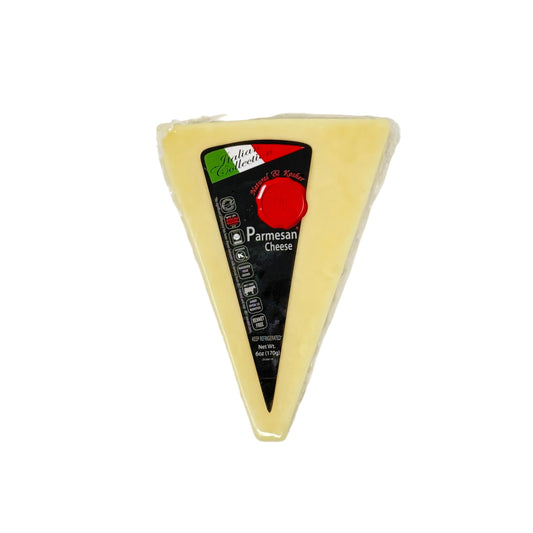 Triangular block of Parmesan cheese with a label on a white background
