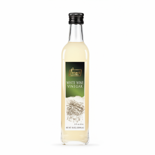 Bottle of white wine vinegar with a label on a white background
